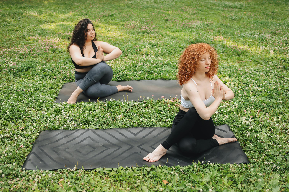 Two girls excercising together